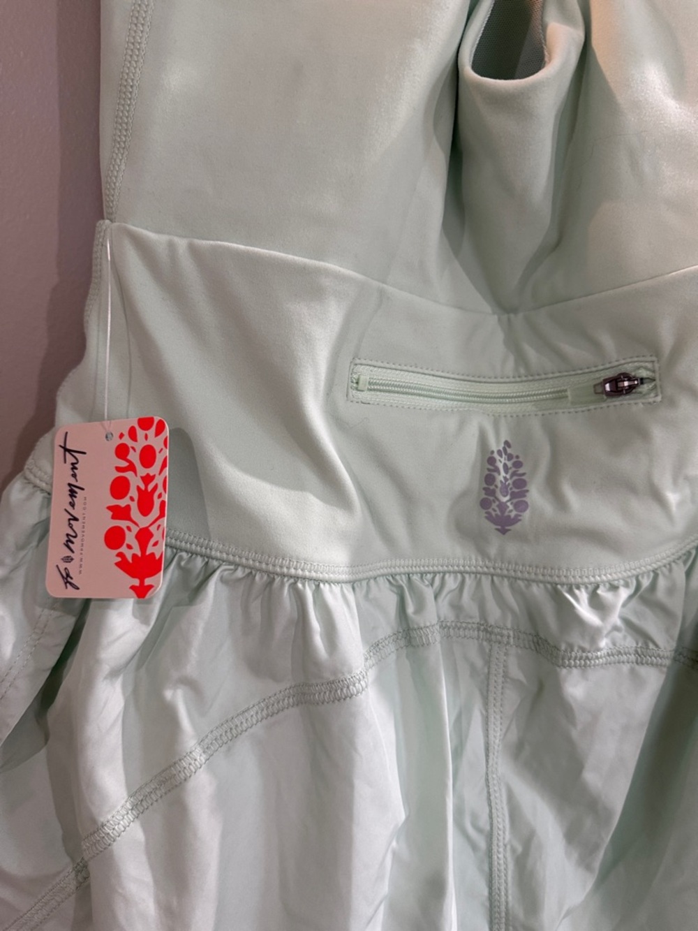NEVER WORN. Free People Movement Mint Green Sleeveless Romper with Cutout - Picture 4 of 4